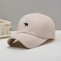 Classic beige cotton baseball cap with minimalist black bear embroidery detail - Adjustable / Off White