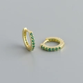 Close-up of S925 sterling silver hoop earrings with green zircon stones in gold finish - Gold Green Zirconia