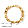 Close-up of 18K gold plated stainless steel chunky chain bracelet with lobster clasp detail - Oval Ring Cylindrical Textured (NB-B1071-G) / Gold