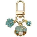 Exquisiter blauer Muschel-Schlüsselanhänger mit Perle, Kleeblatt und blauen Strass - Blau Ozean Perle Muschel Sakura
