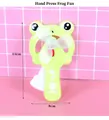 Front view of green frog hand-press mini fan with dimensions 15cm height and 8cm width - Green Frog