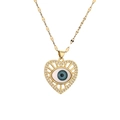 Gold evil eye heart necklace with blue center and white zirconia stones on white backdrop - Openwork Heart Evil Eye