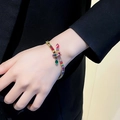 Gold plated snake-shaped bracelet with multi-color cubic zirconia gemstones for women - Snake Bracelet