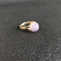 Macro detail of handmade gold wire wrapped ring with a round purple crystal gemstone - Adjustable Open / Light Amethyst