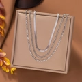 Silver triple layered necklace set featuring flat snake chain and link chain styling - Figaro Triple Chain / Steel
