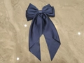 Navy blue satin bow hair clip with long ribbons on marble surface background - Navy Blue