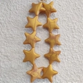 Golden marble pattern star keychain charm with stylish silicone beads on plush background - Gilded Gold (10 Stars)