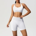 Close-up of white ribbed waistband and seamless knit fabric on yoga set shorts - XS / Off-White