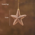 Sparkling 15cm gold Christmas tree star topper with glitter finish and hanging cord - 15cm Champagne Gold Star Ornament
