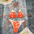 Two-piece bikini set with orange skull print featuring halter top and tie-side bottoms - S / Orange/White Skull Print