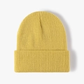 Classic mustard yellow knitted beanie hat with stylish cuffed design for winter warmth - Autumn Yellow