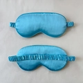 Sky blue satin sleep mask with smooth silk texture and elasticated ruched head strap - Sky Blue