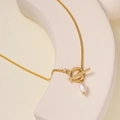 Detail of 18K gold stainless steel toggle clasp necklace with a freshwater pearl pendant - Gold (JZ-N24621G)