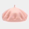 Detail shot of soft pink wool beret showing fine felt texture and classic top stem - One Size / Pink