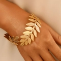 Close-up of gold leaf-shaped open cuff bracelet featuring realistic branch textures - Golden Olive Branch Leaf Open Bracelet (30)