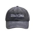 Detail of white GRANDMA embroidery on washed dark grey cotton baseball cap texture - Black-GRANDMA