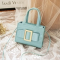 Light blue faux leather handbag with crocodile pattern and golden square buckle - Blue