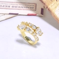 Golden double-row ring with pear-shaped cubic zirconia stones on white background - White Water Drop Style (ZYN-DMR123G-3)