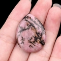Water-drop shaped natural pink quartz stone pendant with unique black veins - Rhodonite