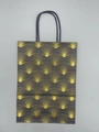 Dark brown kraft gift bag featuring gold foil dot pattern and black rope handles - Bronzing Fan Shaped
