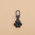 Matte black claw-shaped detachable metal zipper pull replacement for bags and coats - Footprint Black