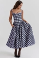 Detail of blue plaid sundress featuring slim bodice and flowing A-line skirt - Blue Plaid