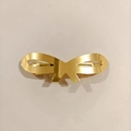 Elegant gold metal bow hair clip with a brushed finish and minimalist spring buckle - Brushed Bow Hair Clip