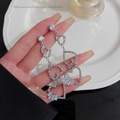 Orecchini S925 in argento con cuori traforati e pendenti di pietre baguette - Frangia Cuore Cavo in Strass Argento (E0330)