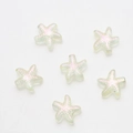 Close-up of six starfish-shaped glass charms with a pink pearlescent finish for DIY jewelry - Pack of 30 / Crystal Yellow