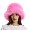 Close-up of fluffy pink faux fox fur texture on a thick winter bucket hat for women - Pink