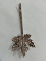 Elegant silver maple leaf hair clip with detailed leaf veins on a textured background - Silver Maple Leaf