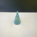 Golden flower bracelet and sleek ring set on a teal cone jewelry display stand - Cyan Blue Cone Ring Holder