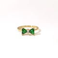 Elegant gold bow ring featuring green triangular stones and a clear center crystal - Gold - Green Zirconia