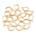 Close-up of golden leverback earring hooks for DIY jewelry making and craft supplies - D-Shape Hook - Gold