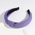 Knotted purple fabric headband with elegant pleated texture and wide top knot design - Deep purple