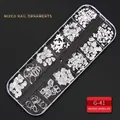 Silver nail art charms in a 12-grid storage box with mixed metallic shapes and rivets - G-41 Style (Silver Multi-shape Mixed Pattern Pieces)