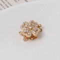 Macro detail of gold-plated rotatable flower clasp with micro-set cubic zirconia stones - 11# 14K Gold Double Row (15*20mm)