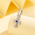 Silver huggie earring with zircon cross pendant and a central round blue sapphire stone - Single Piece / Sapphire Blue