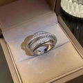 Macro detail of silver-tone multi-layer butterfly ring with pavé zircon setting - Multi-Layer Crisscross Style (HR769) / Adjustable Open / Silver