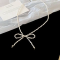 Detail view of a silver metallic bow necklace featuring square block chain elements - Silver Bowknot Square Bead Necklace