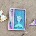 Mermaid stationery gift set with blue sequin notebook and fish tail pen in purple box - Mermaid Blue