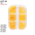 Golden flatback pearls set in six sizes from 1.5mm to 5mm in a clear organizer box - 6-Grid Pearl ZZ06 (Gold Flatback Pearls)