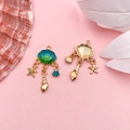 Detail of teal enamel starfish and seashell charms for ocean-themed DIY jewelry - Blue-Green Gradient Drip Oil Ocean Shell (15x35mm)