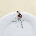 Detail showing a 30mm silver rose pendant with red petals and inlaid crystals - Silver-Red Rose