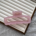 Elegant translucent pink square hair claw clip on a minimalist wooden display tray - 12cm Rectangular Bar / Jelly Pink