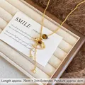 Goldene Schaukelpferd-Halskette mit Tigerauge und Zirkon, 70cm lange Pulloverkette - Halskette-Gold-Braun-Pony