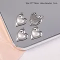 Détail des breloques cœur et nœud en alliage argenté, 22x19mm pour création de bijoux - Cœur de Perle