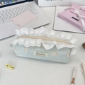 Close-up of blue cat print pencil case featuring white lace edges and Soraaka brand label - Orange Cat/Rabbit Print (Sozakka) / Light Green