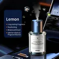 Smart car humidifier with 160ml lemon fragrance in grey metal and glass bottle - Lemon