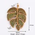 Golden Monstera leaf pendant with green micro-pave zircons for DIY jewelry making - Green Monstera Leaf / Green